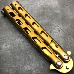 GOLD Butterfly Balisong Trainer Knife Training Comb Blade Stainless Practice 17 GOLD Butterfly Balisong Trainer Knife Training Comb Blade Stainless Practice -BLADE ADDICT Sales blade addict butterfly knife gold butterfly balisong trainer knife training comb blade stainless practice 21537710997703